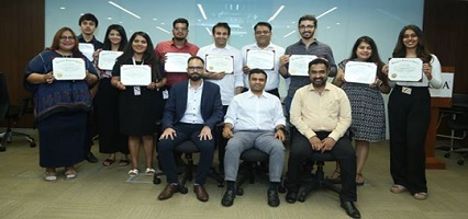 GIA Graduate Diamonds Diploma (Blended) students with their certificates