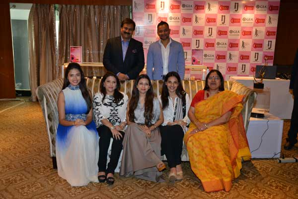 (L to R) Manasi Moghe, Bunty Bajaj, Sounia Gohil, Poonam Soni & Nirupa Bhatt; (standing) Rajiv Jain (L) & Aftab Bandukwala (R)