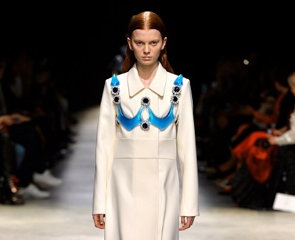 In his fall 2020 collection, Christopher Kane used jewels and silicone shapes to adorn simple coats and dresses